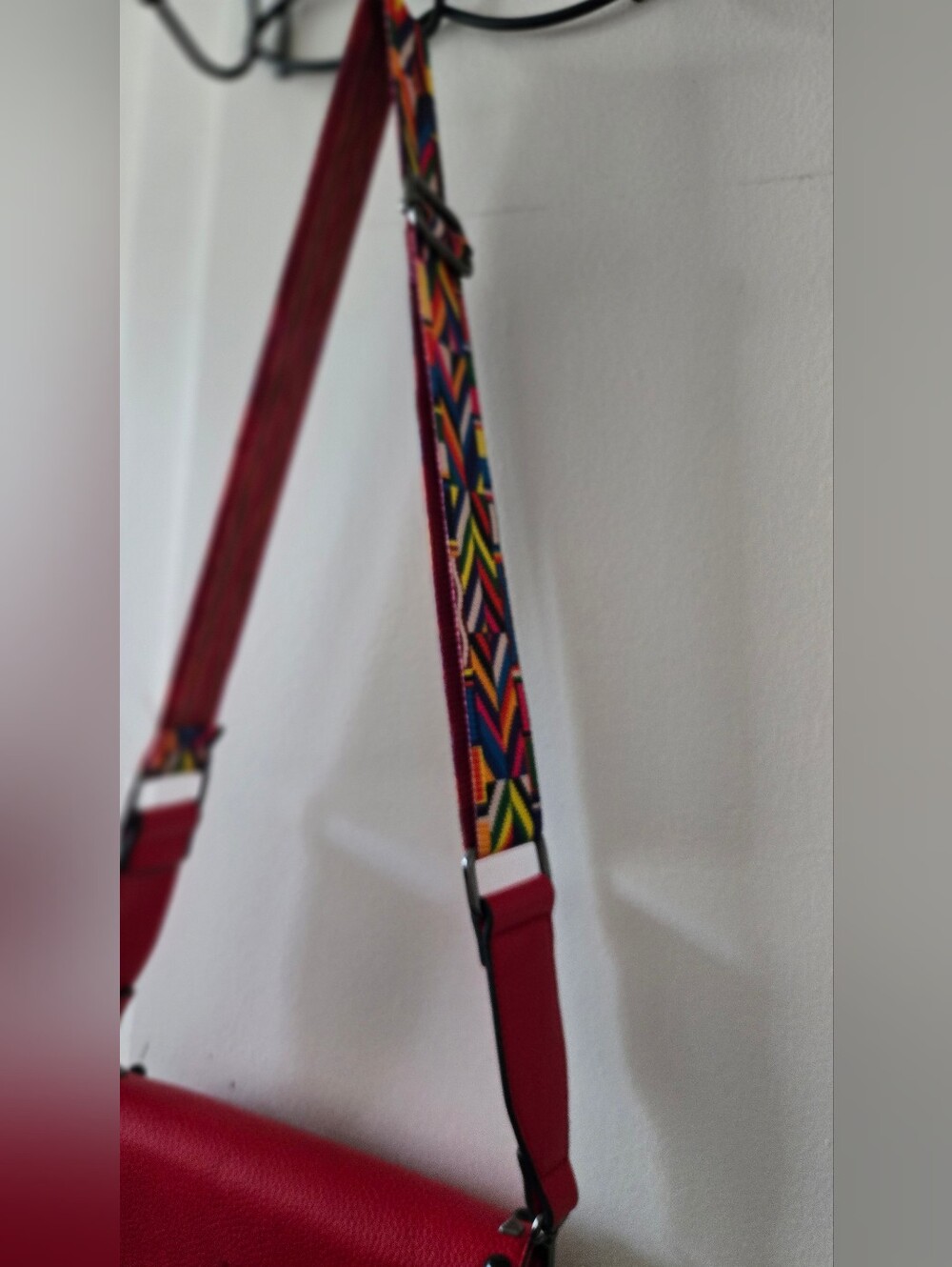 MERSI's coveted Ruby Red Studded Crossbody Bag with Multicolor Geo Strap - Picture 6 of 8